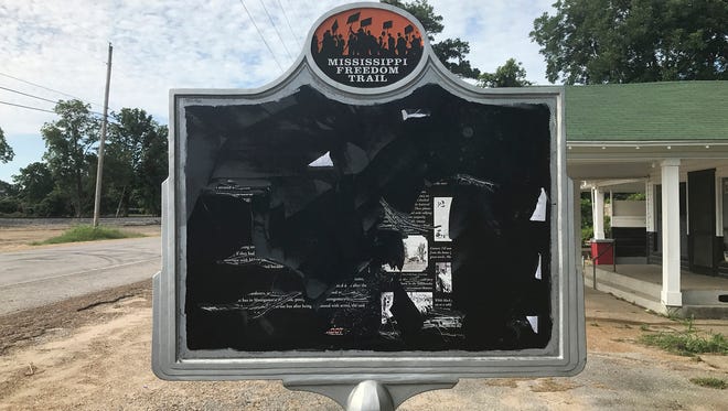 In this June 2017 photo, released by Allan Hammons, a civil rights historical marker in Money, Miss., is seen. The marker remembers black teenager Emmett Till, who was kidnapped before being lynched in 1955. Allan Hammons, whose public relations firm made the marker, said Monday, June 26, 2017, that someone scratched the marker with a blunt tool in May.