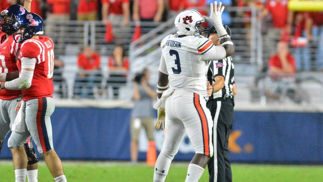 Auburn defensive lineman Marlon Davidson (3) celebrates after a play during the second half against Mississippi.
