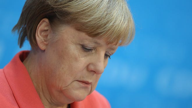 German Chancellor Angela Merkel speaks to the media in Berlin on Sept. 19.
