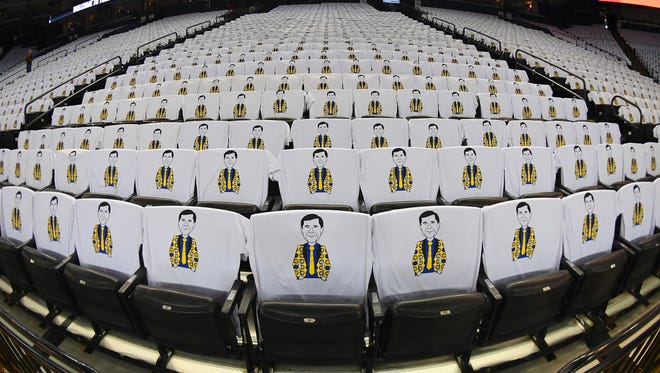 Prior to an NBA basketball game between the San Antonio Spurs and Golden State Warriors is seen in detailed view of Craig Sager-Themed T-shirts on the back of the seats provided for all fans in attendance by City National Bank as a tribute to the iconic TNT sideline reporter and his ongoing fight against leukemia. at ORACLE Arena on October 25, 2016 in Oakland, California.