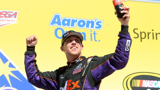 Hamlin wins the Aaron's 499 at Talladega Superspeedway on May 5, 2014.