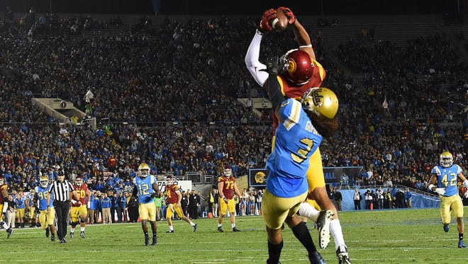 USC wide receiver De'Quan Hampton (13) catches a touchdown in the second quarter against UCLA.