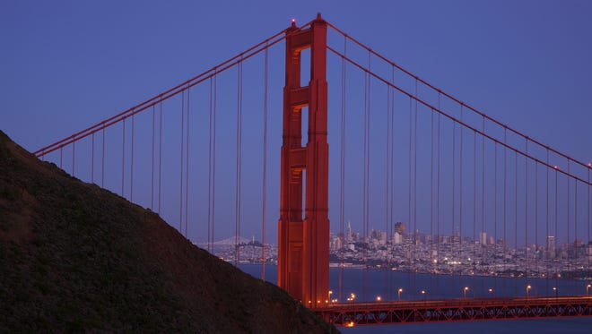 The Golden Gate Bridge is seen with the city of San Francisco behind it. San Francisco is United's fifth-biggest hub (by passengers).