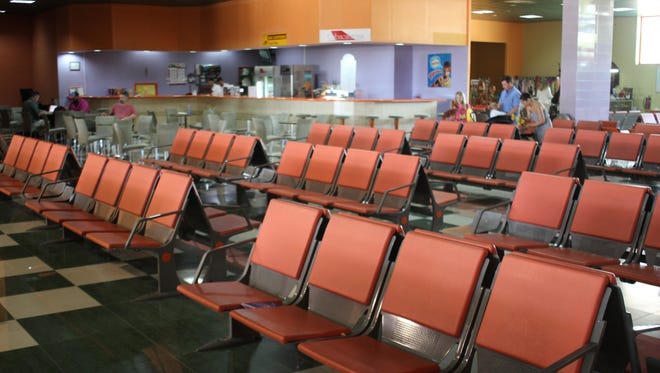 After clearing immigration and security there is plenty of room to sit, but little else in the way of amenities in the terminal at the Santa Clara airport.
