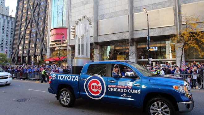 A truck with a replica Commissioner's Trophy on Michigan Ave.