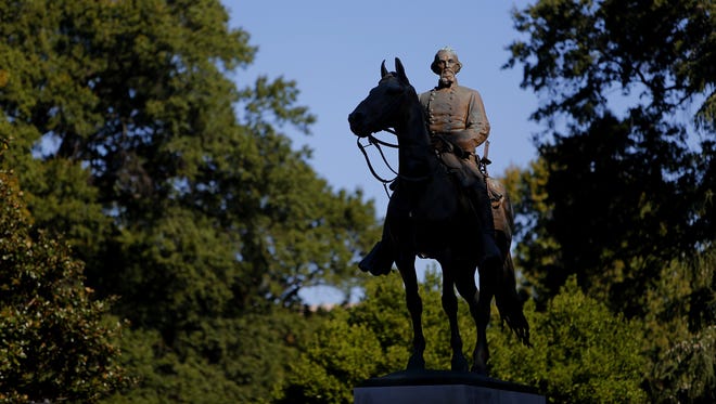 A statue of Nathan Bedford Forrest stands in Health Sciences Park near Downtown Memphis.