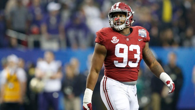 Alabama Crimson Tide defensive lineman Jonathan Allen (93) walks on the field during the first quarter in the 2016 CFP Semifinal against the Washington Huskies at the Georgia Dome.