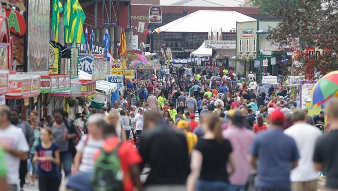 Thousands of people visit the fair on opening day.