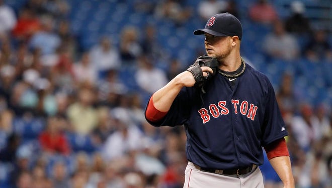 Jon Lester helped guide the Red Sox to two World Series titles in 2007 and 2013.