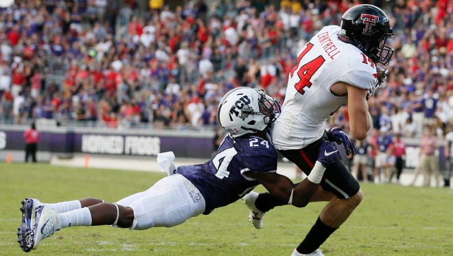 Texas Tech wide receiver Dylan Cantrell (14) scores the game-tying touchdown against TCU in the fourth quarter.