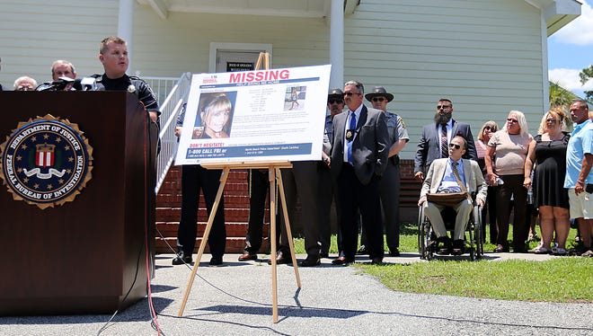 Lt. Joey Crosby of the Myrtle Beach Police speaks at a news conference as Brittanee Drexel's family and their supporters listen during a news conference in McClellanville, S.C. on  April 8, 2016.
