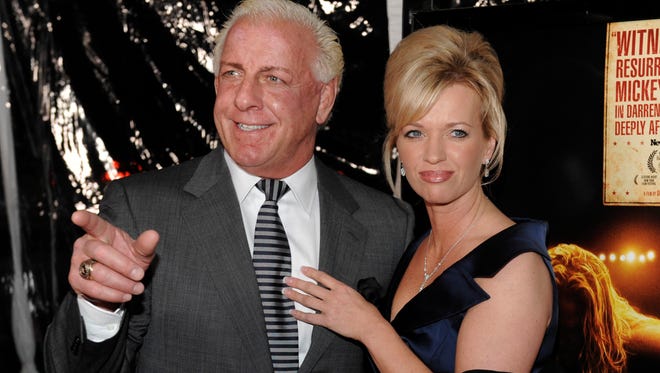 Ric Flair and his then-girlfriend Jackie arrive at the premiere of the film "The Wrestler" at the Academy of Motion Picture Arts and Sciences in Beverly Hills, Calif., in 2008.