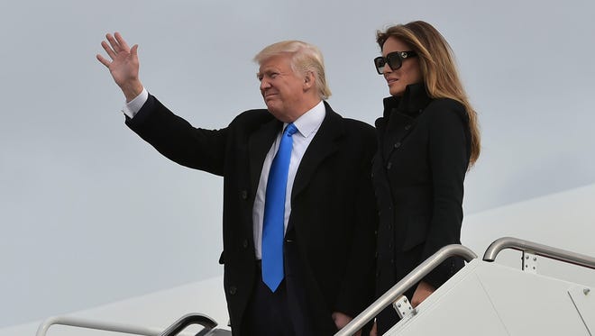 President-elect Donald Trump and his wife, Melania, step off a plane upon arrival at Andrews Air Force Base in Maryland on Jan. 19, 2017, ahead of the inauguration. Here's a look back at his career and presidential campaign.
