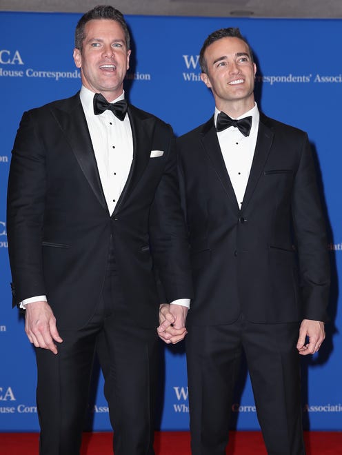 Journalist Thomas Robert, left and Patrick Abner attend the WHCD soiree.