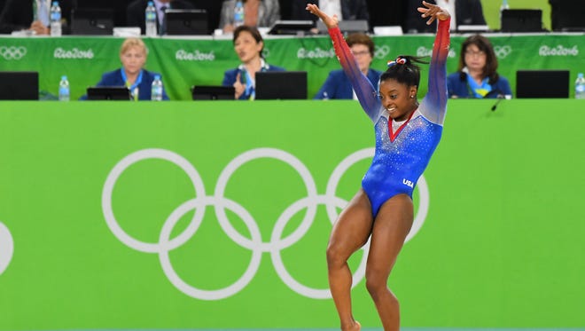 Simone Biles (USA) competes during to the women's floor exercise final in the Rio 2016 Summer Olympic Games at Rio Olympic Arena.