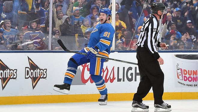 St. Louis Blues right wing Vladimir Tarasenko (91) celebrates after scoring a goal against the Chicago Blackhawks during the third period in the 2016 Winter Classic.