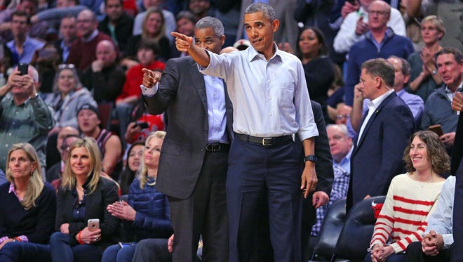 United States president Barack Obama during a game between the Chicago Bulls and the Cleveland Cavaliers at the United Center.