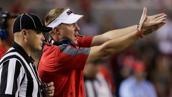 Mississippi head coach Hugh Freeze argues a call in the second half of an NCAA college football game against Alabama in Tuscaloosa, Ala., Saturday, Sept. 28, 2013. Alabama beat Mississippi 25-0.
