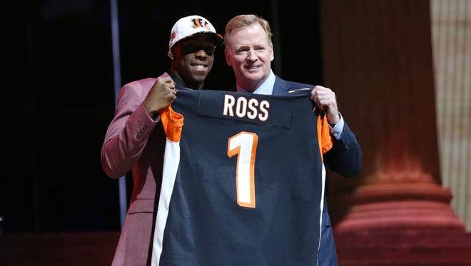 John Ross (Washington) poses with NFL commissioner Roger Goodell (right) as he is selected as the number 9 overall pick to the Cincinnati Bengals in the first round the 2017 NFL Draft at the Philadelphia Museum of Art.