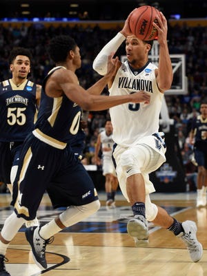 Villanova guard Josh Hart (3) drives to the basket against Mount St. Mary's guard Junior Robinson (0) in the second half.