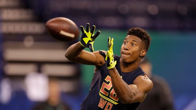 East Carolina wide receiver Zay Jones runs a drill at the NFL football scouting combine Saturday, March 4, 2017, in Indianapolis. (AP Photo/David J. Phillip)