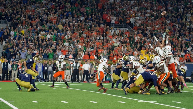 Notre Dame kicker Justin Yoon (19) hits the game-winning field goal against Miami.
