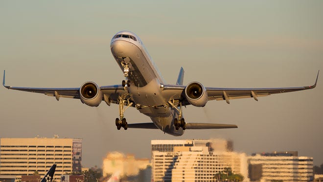 A United Airlines Boeing 757-200 takes off from sunny Los Angeles International Airport in November 2015.
