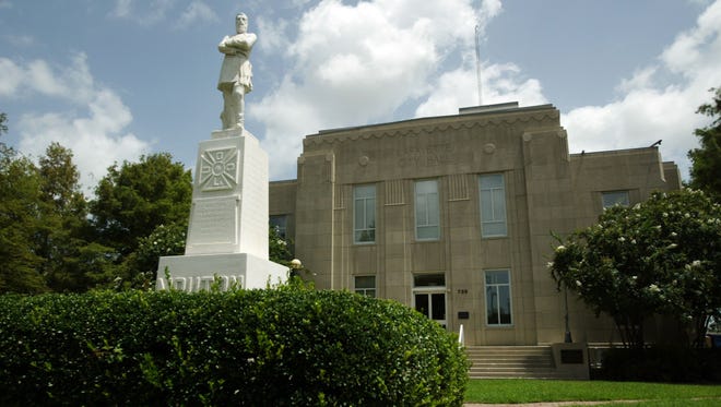 A July 13, 2010 photo shows a statue of General Alfred Mouton in front of the old city hall building, now Le Centre International de Lafayette, on Jefferson Street in downtown Lafayette.