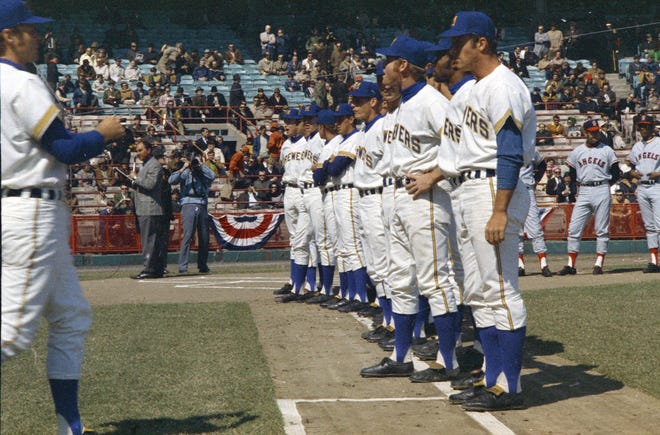 Brewers players line up along first base for introductions in the pre-game ceremony during the Brewers' first opening day on April 7, 1970. The game was also the season opener for the Brewers. A crowd of 37,237 saw the Brewers fall to the California Angels 12-0.