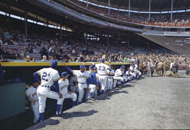 The Brewers lined up in the dugout for pre-game ceremonies during the Brewers' first opening day on April 7, 1970. It was also the season opener for the Brewers. A crowd of 37,237 saw the Brewers fall to the California Angels 12-0.