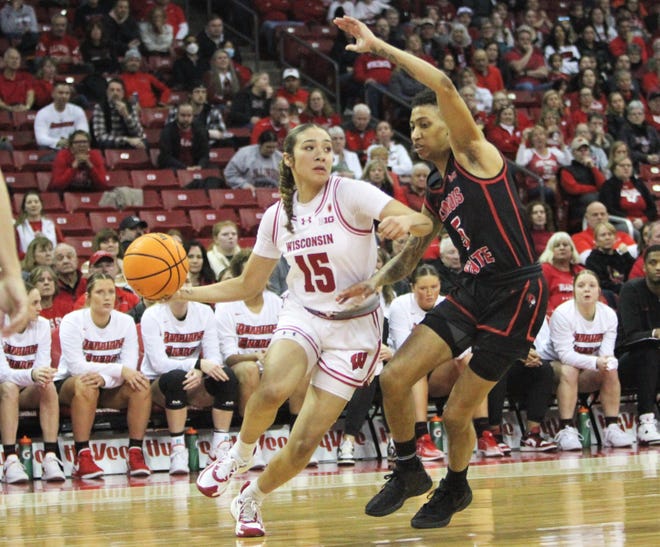Wisconsin's Sania Copeland (15) drives into the paint against Illinois State's Daijah Smith during a Round of 16 WNIT game at the Kohl Center in Madison, Wisconsin on Thursday March 28, 2024.
