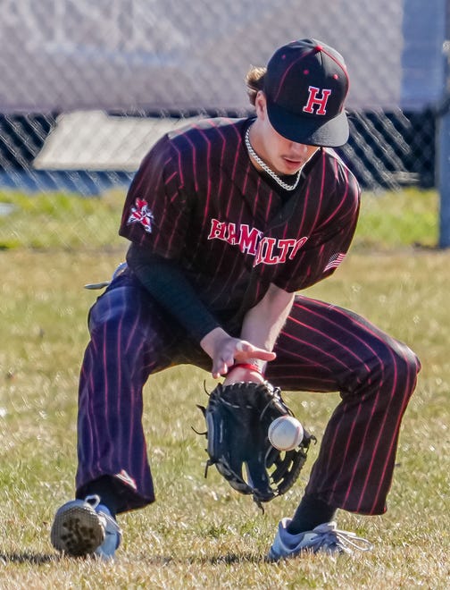 Sussex Hamilton left fielder Cody Heisdorf (9) fields the ball during the game at Brookfield Central on Saturday, April 6, 2024.