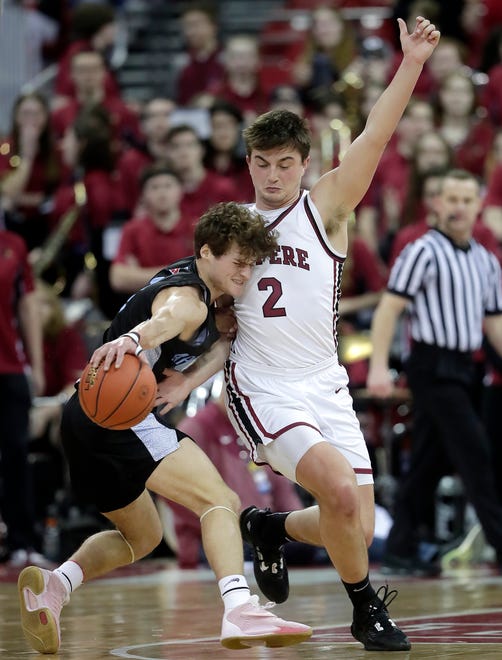 De Pere High School's Gabe Herman (2) against Arrowhead High School's Alex Kramer (2) during their WIAA Division 1 state championship boys basketball game on Saturday, March 18, 2023 at the Kohl Center in Madison, Wis. De Dere won the game 69-49 to finish the season a perfect 30-0.
Wm. Glasheen USA TODAY NETWORK-Wisconsin