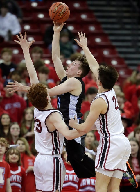 De Pere High School's Will Hornseth (13) and De Pere High School's Gabe Herman (2) defend againstArrowhead High School's Bennett Basich (14) during their WIAA Division 1 state championship boys basketball game on Saturday, March 18, 2023 at the Kohl Center in Madison, Wis. De Dere won the game 69-49 to finish the season a perfect 30-0.
Wm. Glasheen USA TODAY NETWORK-Wisconsin