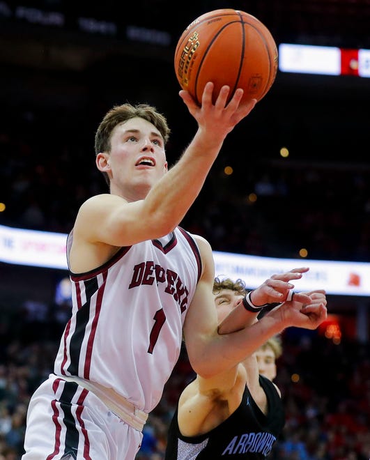 De Pere High School's John Kinziger (1) goes up for a layup against Arrowhead High School during the WIAA Division 1 boys basketball state championship game on Saturday, March 18, 2023, at the Kohl Center in Madison, Wis. De Pere won the game, 69-49, to finish the season a perfect 30-0.
Tork Mason/USA TODAY NETWORK-Wisconsin