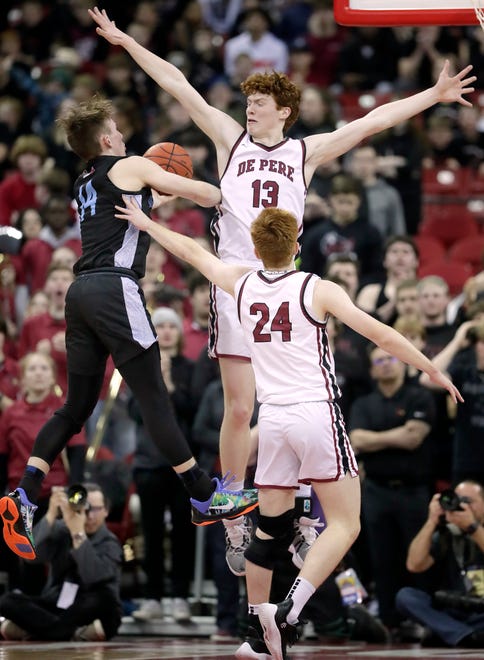 De Pere High School's Will Hornseth (13) and De Pere High School's Ethan Ramos (24) defend against Arrowhead High School's Bennett Basich (14) during their WIAA Division 1 state championship boys basketball game on Saturday, March 18, 2023 at the Kohl Center in Madison, Wis. De Dere won the game 69-49 to finish the season a perfect 30-0.
Wm. Glasheen USA TODAY NETWORK-Wisconsin