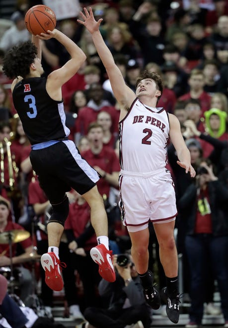 De Pere High School's Gabe Herman (2) against Arrowhead High School's Austin Villarreal (3) during their WIAA Division 1 state championship boys basketball game on Saturday, March 18, 2023 at the Kohl Center in Madison, Wis. De Dere won the game 69-49 to finish the season a perfect 30-0.
Wm. Glasheen USA TODAY NETWORK-Wisconsin
