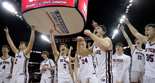 De Pere High School players celebrate their victory over   Arrowhead High School during their WIAA Division 1 state championship boys basketball game on Saturday, March 18, 2023 at the Kohl Center in Madison, Wis. De Dere won the game 69-49 to finish the season a perfect 30-0.
Wm. Glasheen USA TODAY NETWORK-Wisconsin