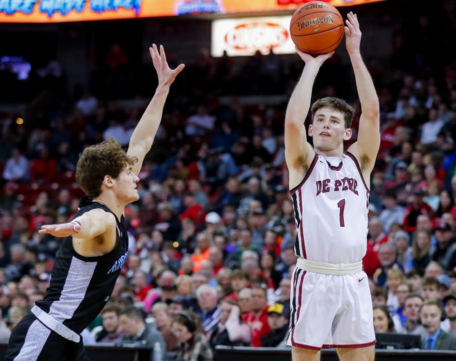 De Pere High School's John Kinziger (1) shoots a 3-pointer against Arrowhead High School during the WIAA Division 1 boys basketball state championship game on Saturday, March 18, 2023, at the Kohl Center in Madison, Wis. De Pere won the game, 69-49, to finish the season a perfect 30-0.
Tork Mason/USA TODAY NETWORK-Wisconsin