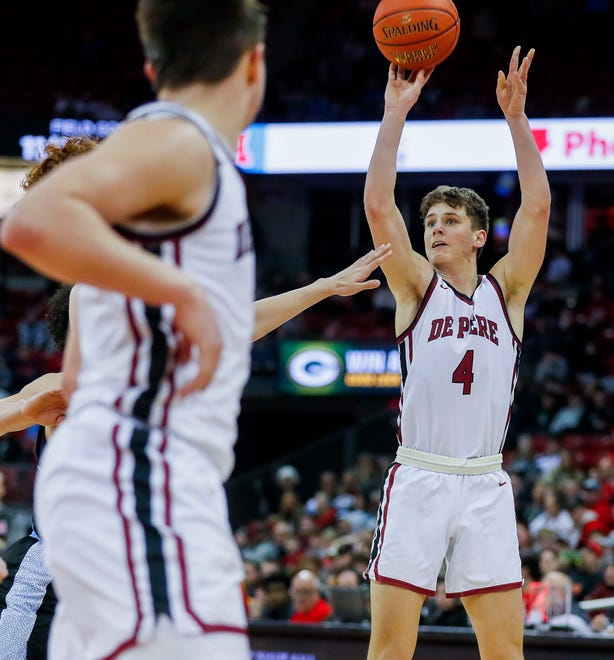 De Pere High School's Zach Kinziger (4) shoots the ball against Arrowhead High School during the WIAA Division 1 boys basketball state championship game on Saturday, March 18, 2023, at the Kohl Center in Madison, Wis. De Pere won the game, 69-49, to finish the season a perfect 30-0.
Tork Mason/USA TODAY NETWORK-Wisconsin