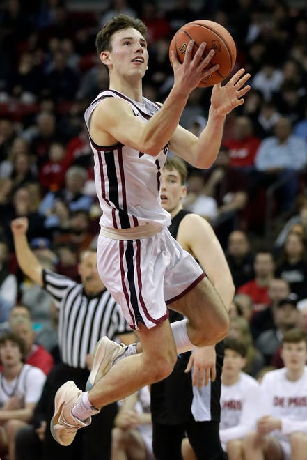 De Pere High School's John Kinziger (1) against Arrowhead High School during their WIAA Division 1 state championship boys basketball game on Saturday, March 18, 2023 at the Kohl Center in Madison, Wis. De Dere won the game 69-49 to finish the season a perfect 30-0.
Wm. Glasheen USA TODAY NETWORK-Wisconsin