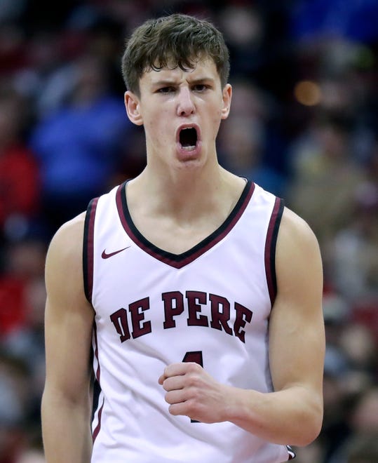 De Pere High School's John Kinziger (1) reacts to a Redbirds’ basket against Arrowhead High School during their WIAA Division 1 state championship boys basketball game on Saturday, March 18, 2023 at the Kohl Center in Madison, Wis. De Dere won the game 69-49 to finish the season a perfect 30-0.
Wm. Glasheen USA TODAY NETWORK-Wisconsin
