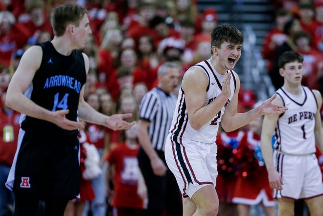De Pere High School's Gabe Herman (2) reacts to an Arrowhead High School turnover during the WIAA Division 1 boys basketball state championship game on Saturday, March 18, 2023, at the Kohl Center in Madison, Wis. De Pere won the game, 69-49, to finish the season a perfect 30-0.
Tork Mason/USA TODAY NETWORK-Wisconsin