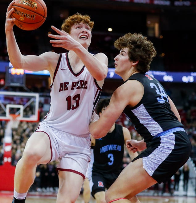 De Pere High School's Will Hornseth (13) goes up for a shot against Arrowhead High School during the WIAA Division 1 boys basketball state championship game on Saturday, March 18, 2023, at the Kohl Center in Madison, Wis. De Pere won the game, 69-49, to finish the season a perfect 30-0.
Tork Mason/USA TODAY NETWORK-Wisconsin