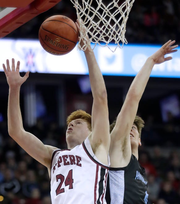 De Pere High School's Ethan Ramos (24) against Arrowhead High School's Mac Wrecke (4) during their WIAA Division 1 state championship boys basketball game on Saturday, March 18, 2023 at the Kohl Center in Madison, Wis. De Dere won the game 69-49 to finish the season a perfect 30-0.
Wm. Glasheen USA TODAY NETWORK-Wisconsin