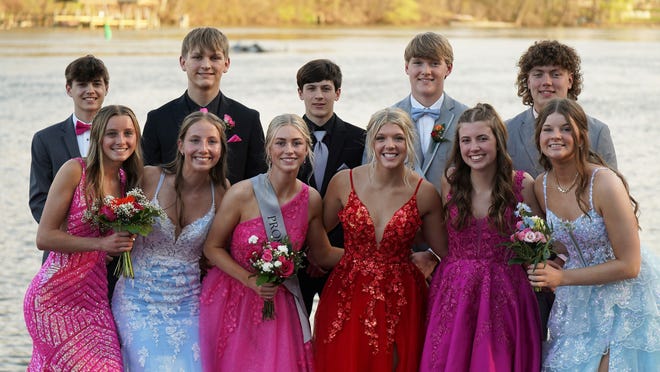 Before Little Chute's prom on Saturday, April 27, 2024, students (back, from left) Dane Kruckeburg, Nathan DePrez, Dominic Fletcher, Dawson Roseman and Isaiah Lamers; (front, from left) Amelia Eiting, Campbell DeBoth, Danica Pfrang, Mylie Lamers, Gracie Hank and Tori Champeau pose for a photo at Lutz Park in Appleton.